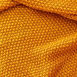 Karaca Home ocker Strickdecke Öko-Tex zertifiziert